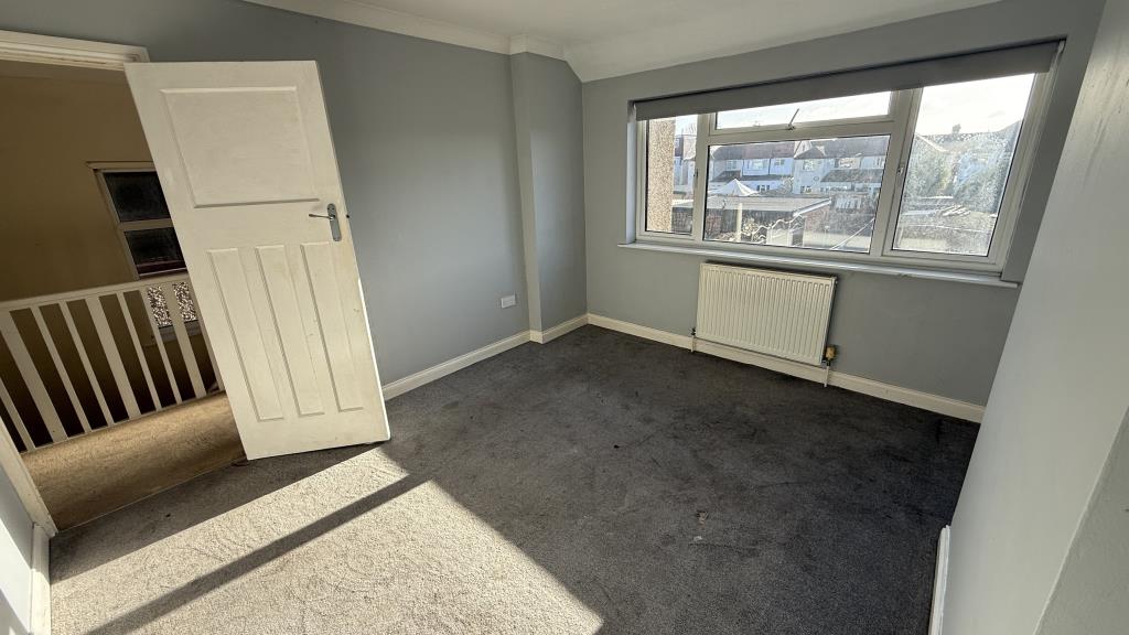 Lot: 32 - HOUSE FOR IMPROVEMENT IN POPULAR RESIDENTIAL AREA - Internal image of bedroom 2 rear